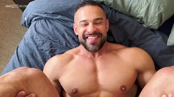 Adam Chen and Leo Jaxxon sharing deep eye contact in the bedroom